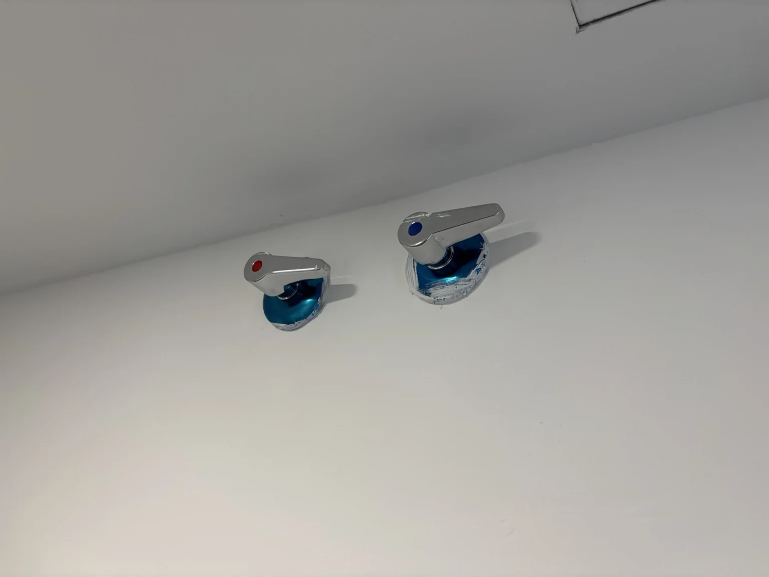 Main water shut-off · both handles horizontal = CLOSED