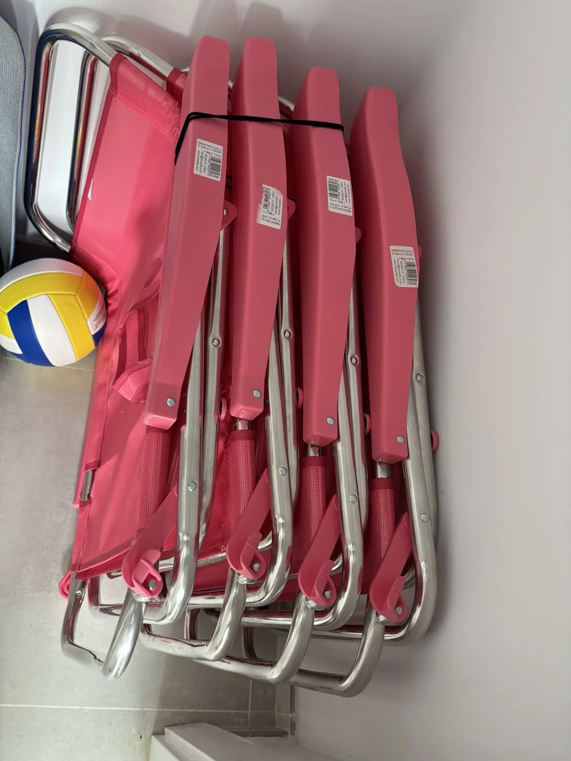 Four folding beach chairs