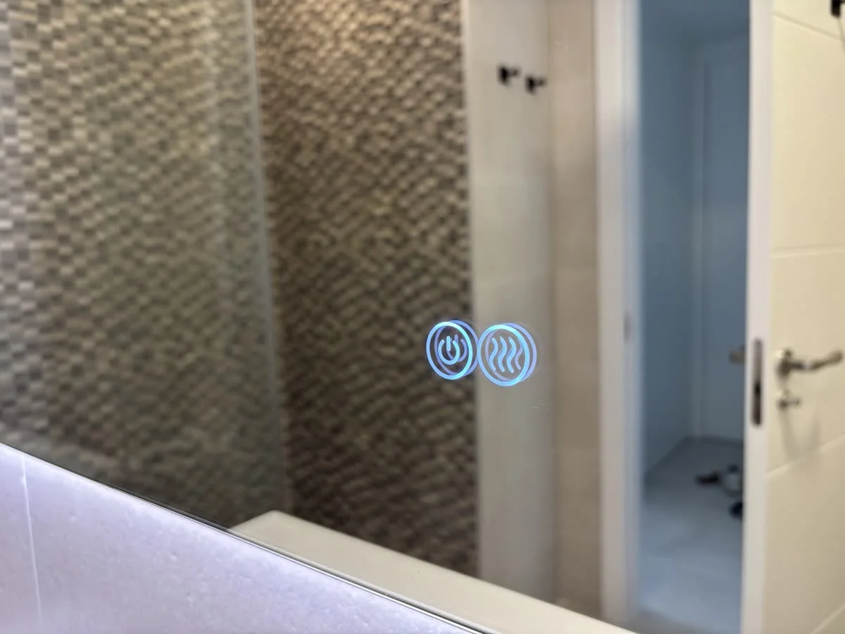 Bathroom mirror controls switched on